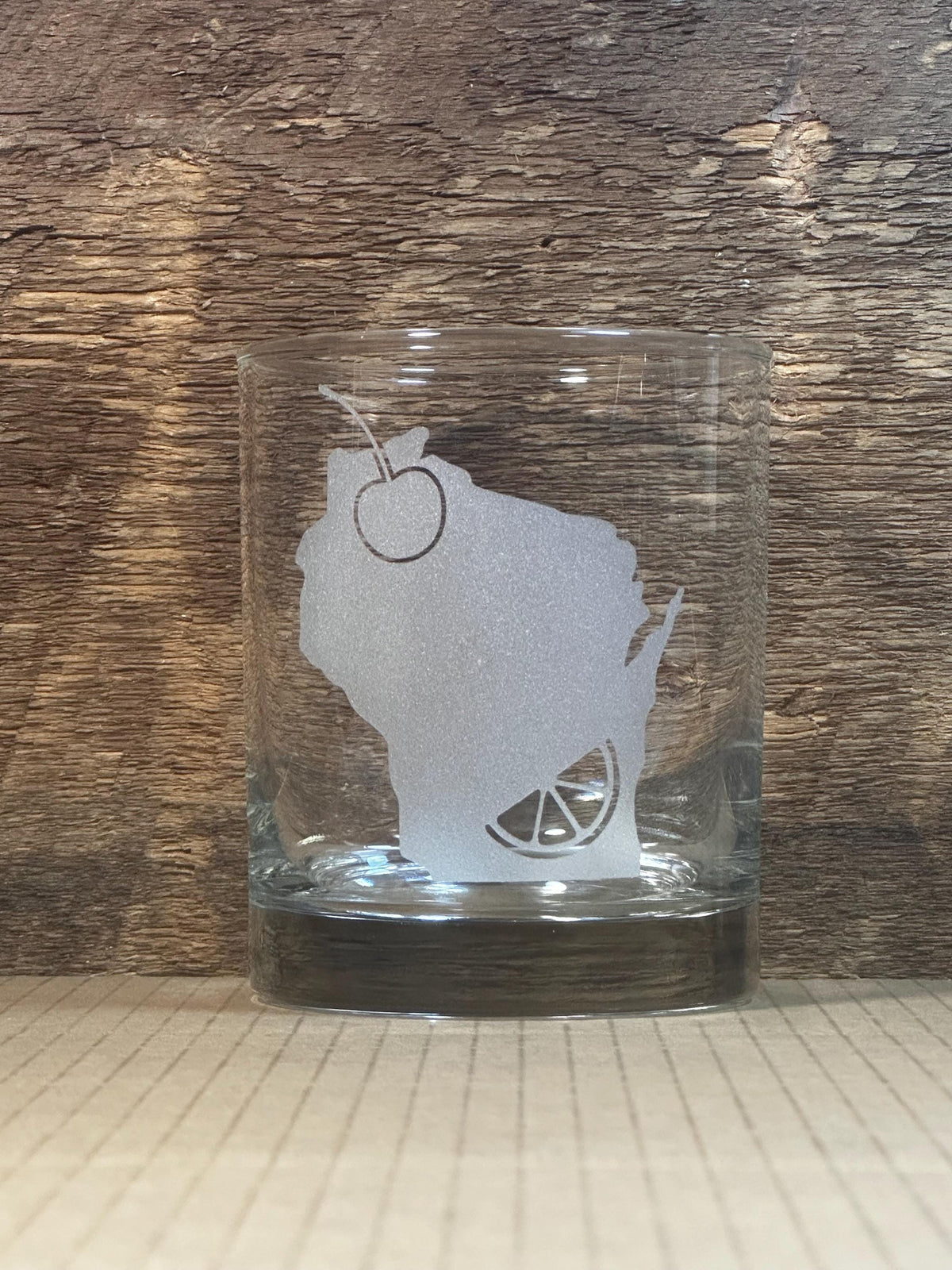 Wisconsin Old Fashioned rocks glass with etched orange slice and cherry