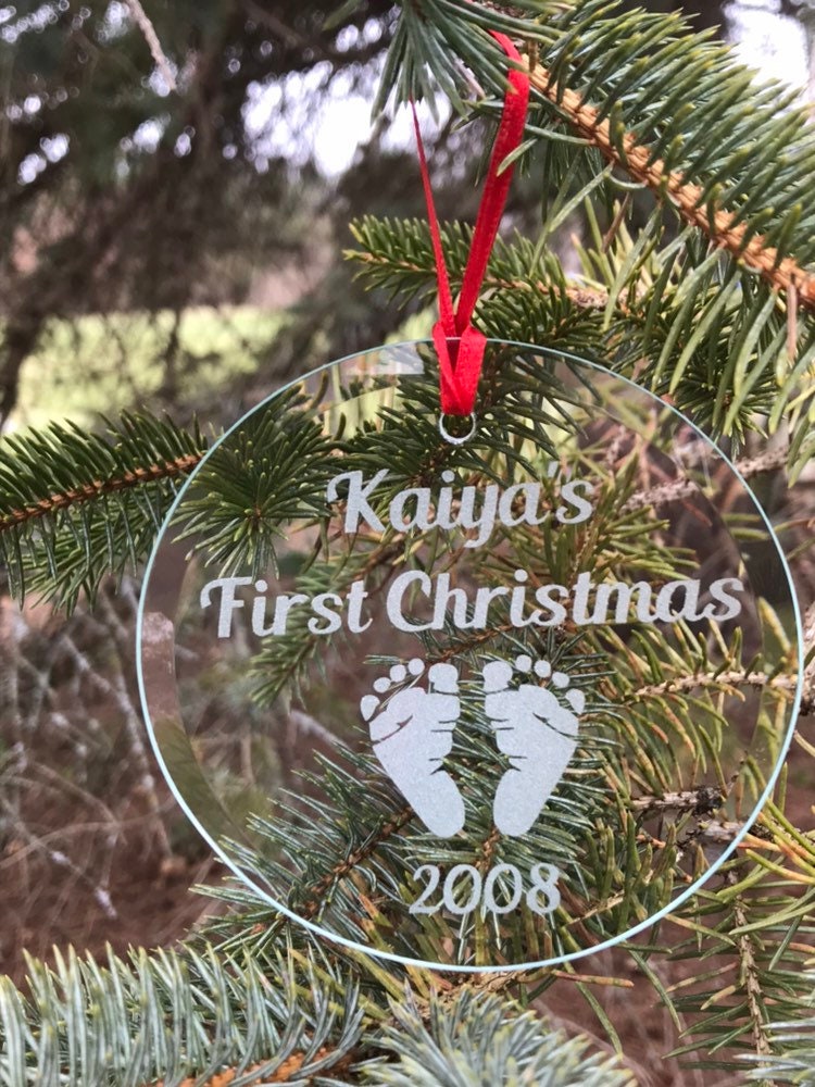 Etched glass ornament on tree